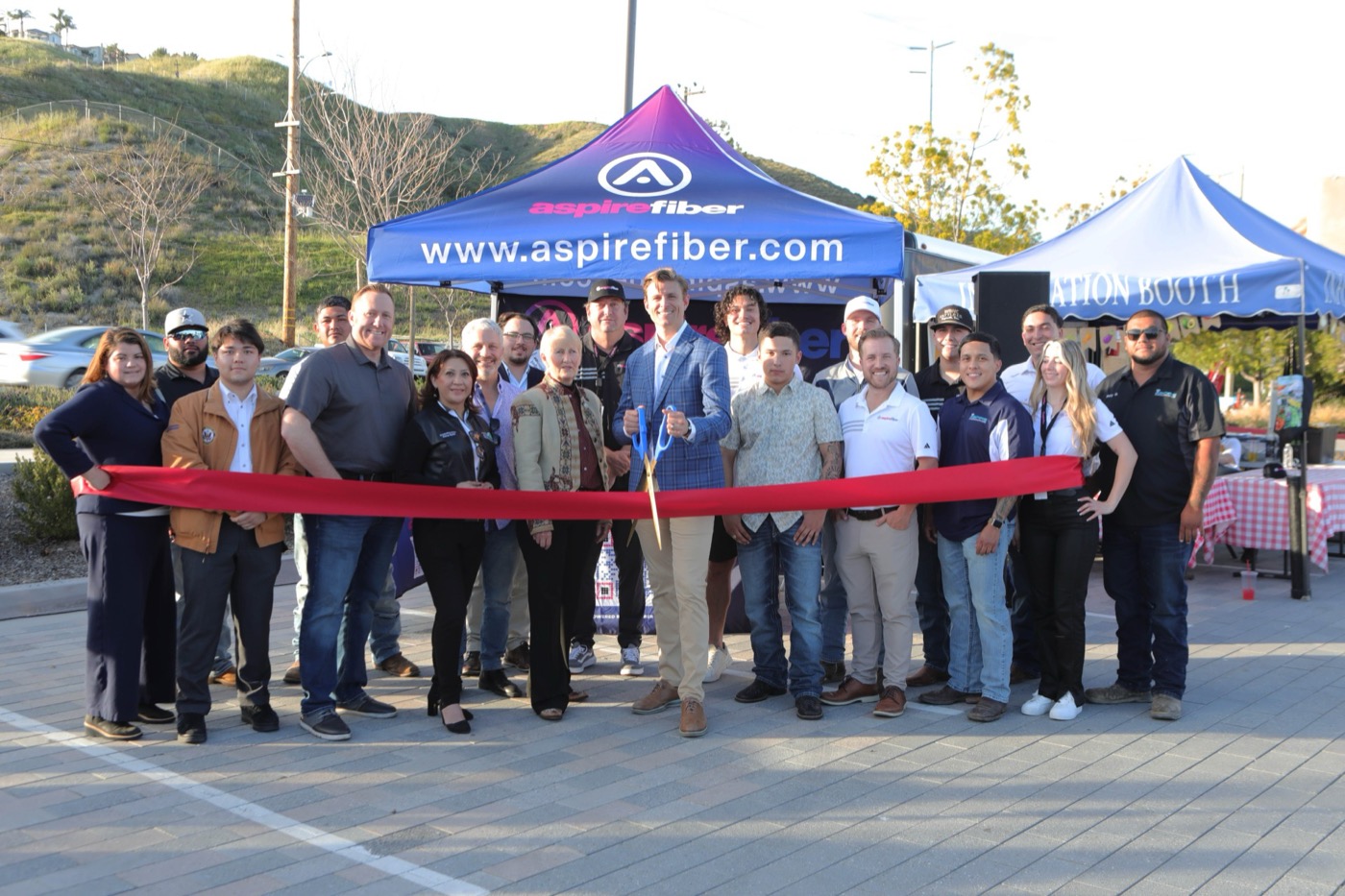 The Aspire Fiber team and local officials cutting the ribbon at a Santa Clarita launch